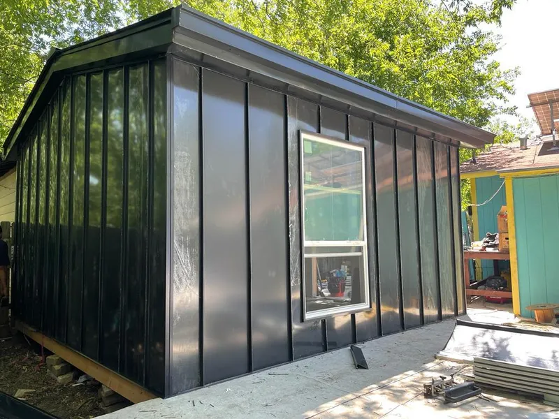 Black standing seam metal wall panels for Roof Inspection in Frenchtown