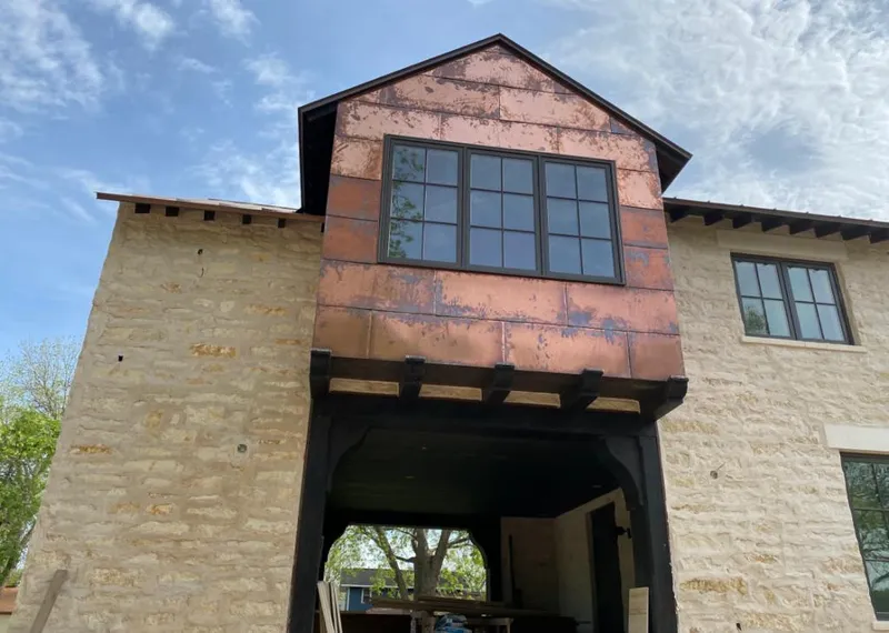 Copper metal panel facade on a stone building for Metal Roof Coating in Frenchtown