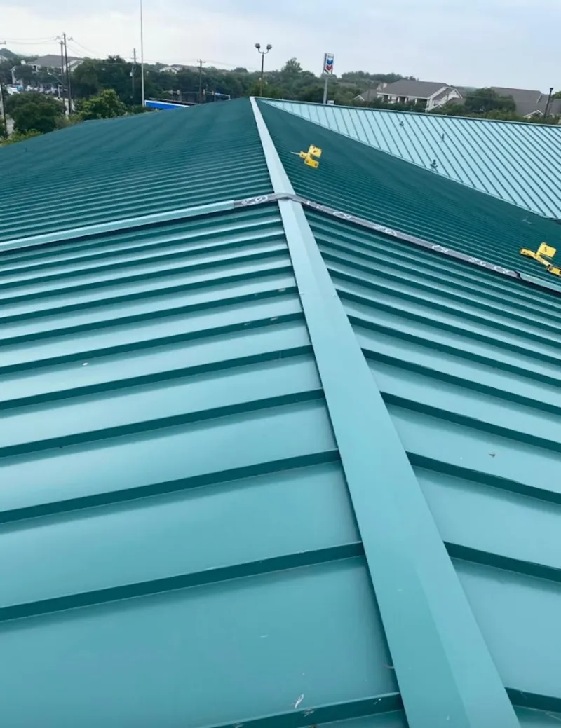 Green commercial metal roof ridge and valley for Metal Roof Repair in Frenchtown
